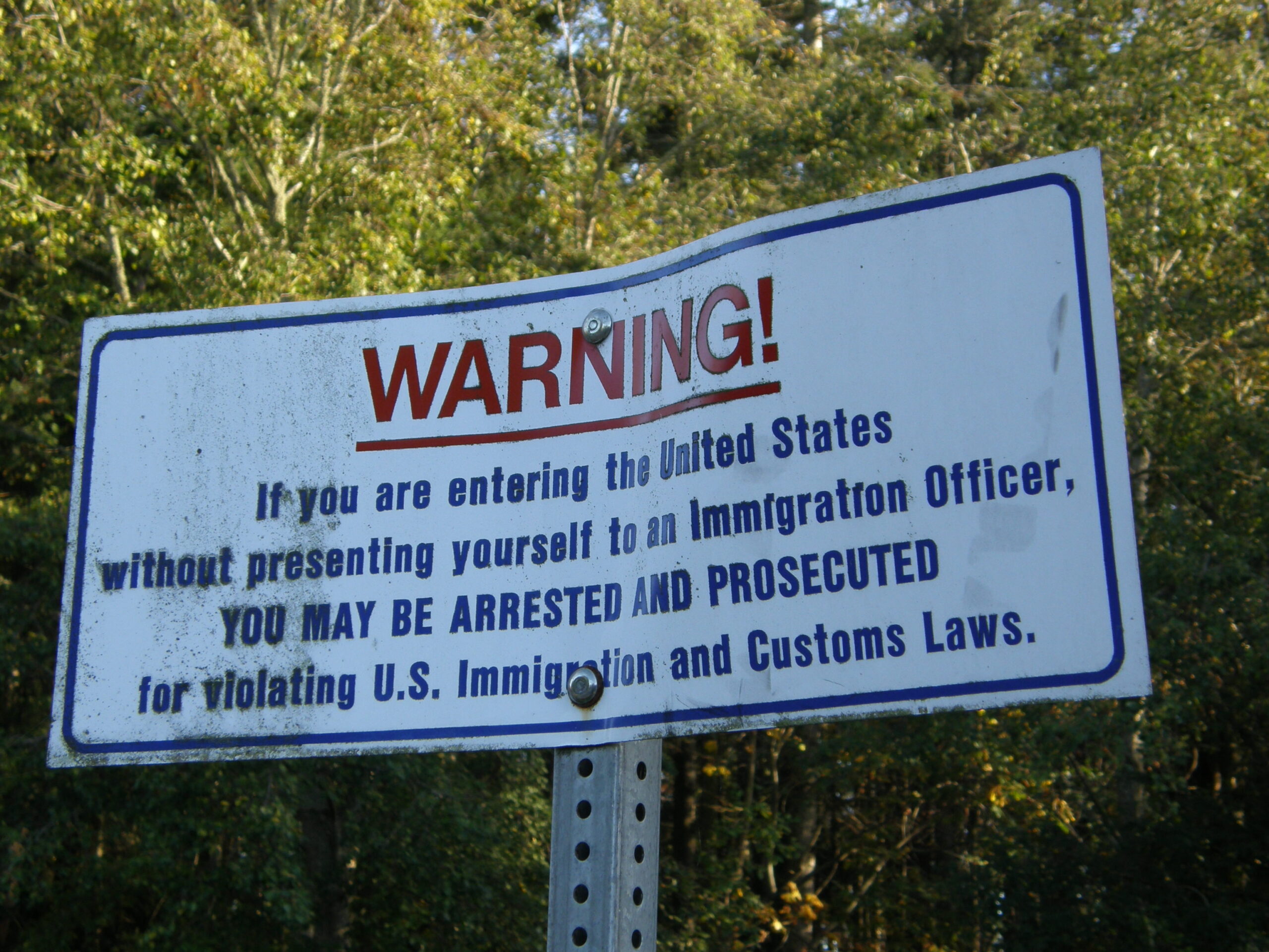 immigration warning sign