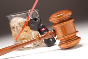 dwi with whiskey, car keys, and gavel