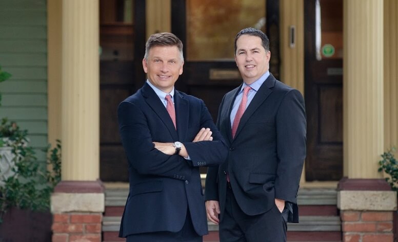 Broden & Mickelsen photo in front of law firm